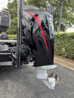 Slide: The Image of 2021 Ranger Z520C Ranger Cup Equipped boat motor with sleek black and red design. - 8