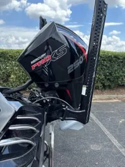 Slide: The Image of 2021 Ranger Z520C boat with Mercury Pro XS 250 engine, parked outdoors. - 9