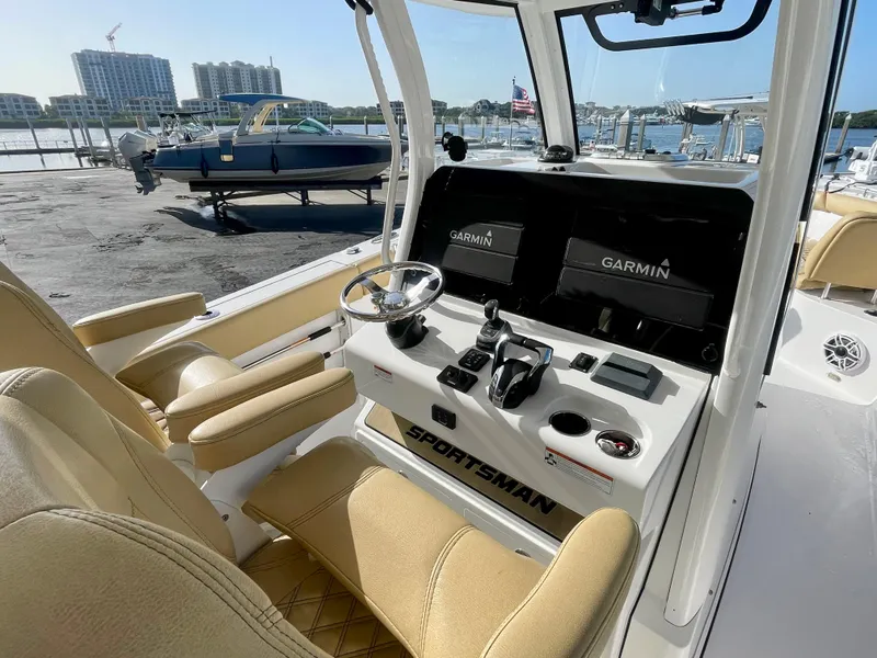 Slide: The Image of Interior view of 2021 Sportsman 302 OPEN boat with Garmin navigation system. - 18