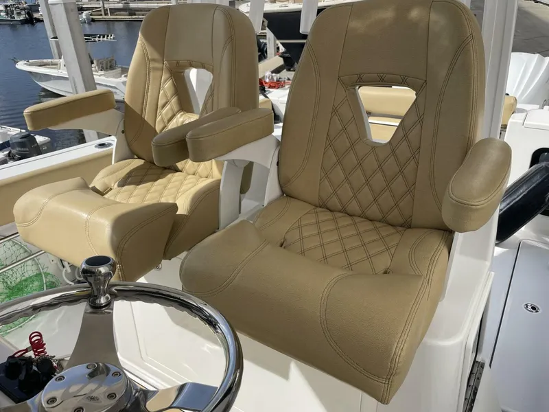 Slide: The Image of Luxurious seating on 2021 Sportsman 302 OPEN boat with diamond-stitched upholstery. - 19