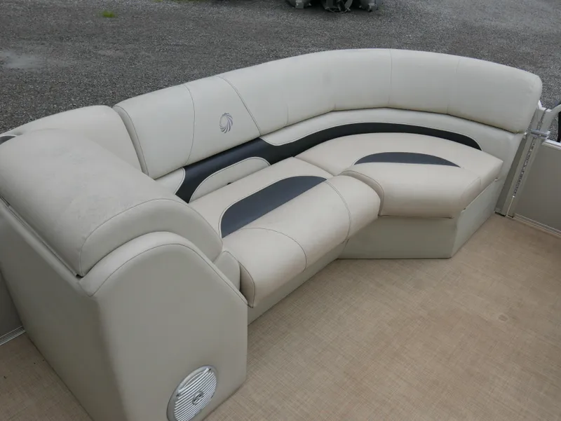 Slide: The Image of 2015 Lowe SS230 boat seating with beige and black upholstery. - 7