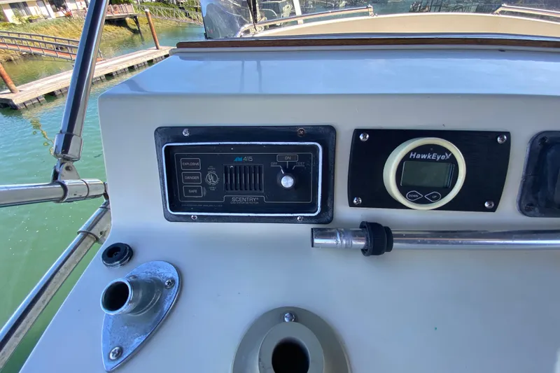 Slide: The Image of Control panel of 1984 Tollycraft 34 Convertible Sedan with HawkEye display. - 46