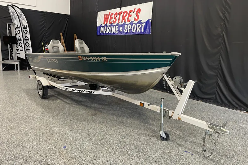 The Image of 2003 Lund 1650-V Rebel Tiller boat on ShoreLand'r trailer at Westre's Marine & Sport. - 0