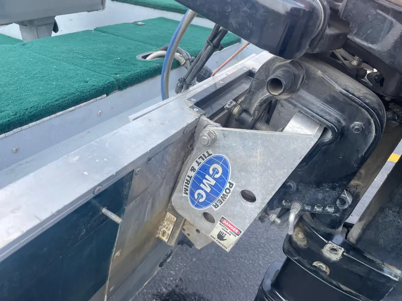 Slide: The Image of 2003 Lund 1650-V Rebel Tiller boat with power tilt and trim mechanism. - 15