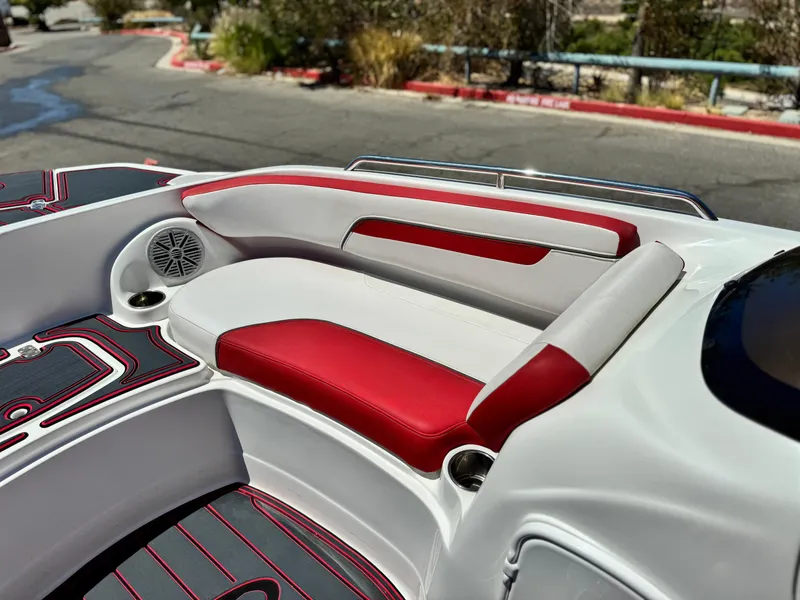 Slide: The Image of 2018 Tracker TAHOE 215 XI boat interior with red and white seating. - 13