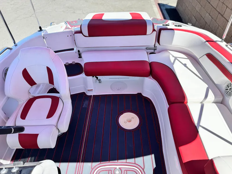 Slide: The Image of 2018 Tracker TAHOE 215 XI boat interior with red and white seating and sleek design. - 19