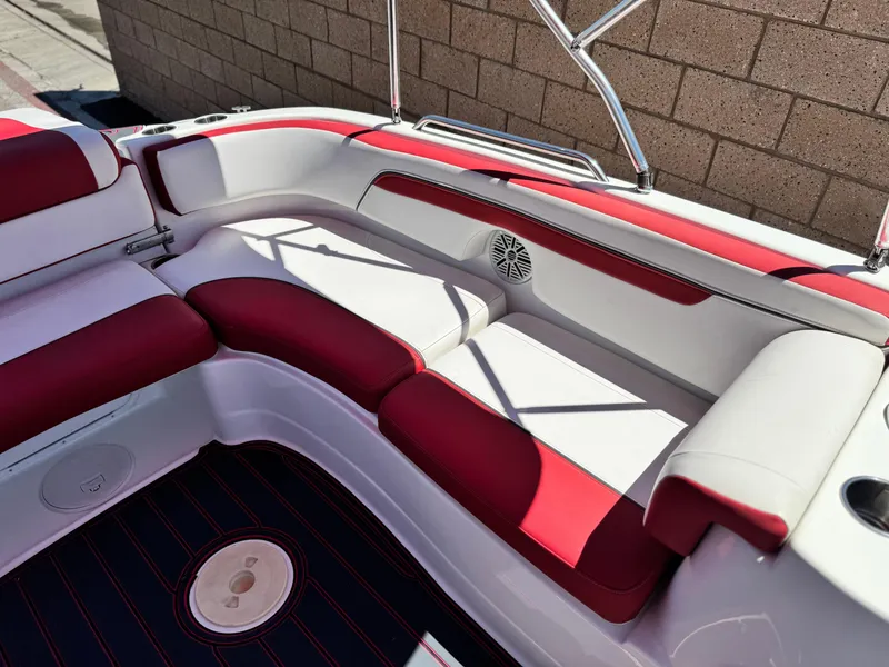 Slide: The Image of 2018 Tracker TAHOE 215 XI boat interior with red and white seating. - 20