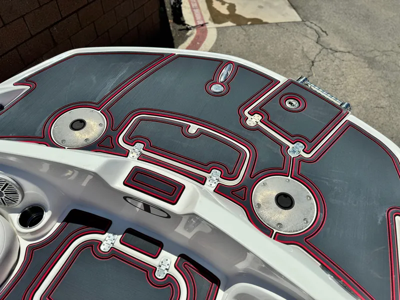 Slide: The Image of 2018 Tracker TAHOE 215 XI boat deck with custom red and gray design. - 9