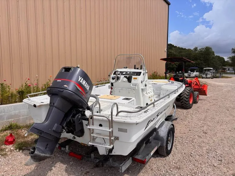 Slide: The Image of 2000 Bay Stealth 1880 Liner boat with Yamaha outboard motor on trailer. - 3