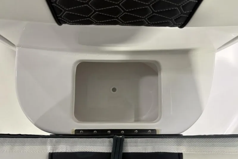 Slide: The Image of 2026 Tidewater 232 CC Adventure boat interior compartment detail. - 10