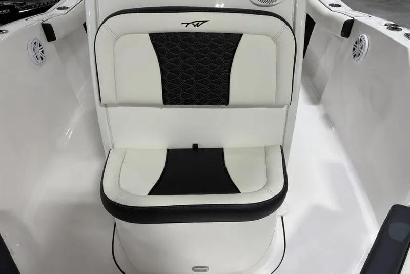 Slide: The Image of 2026 Tidewater 232 CC Adventure boat seat with black and white upholstery design. - 13