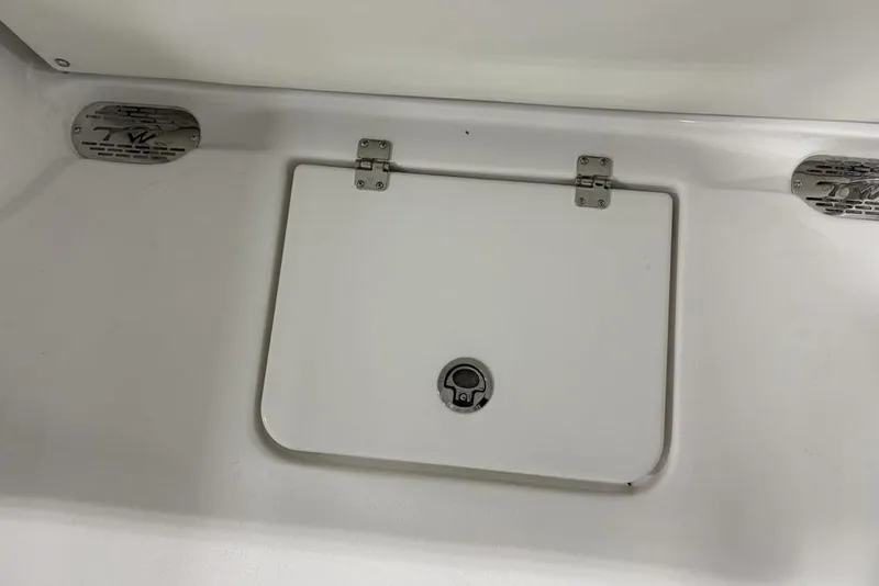 Slide: The Image of Hinged compartment on 2026 Tidewater 232 CC Adventure boat. - 19