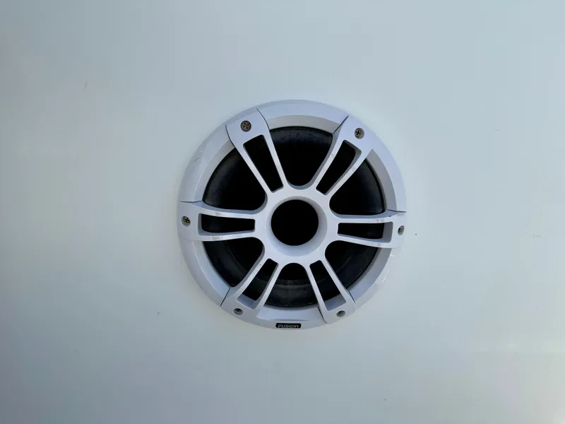 Slide: The Image of 2016 Key Largo 2100 WI CC boat storage compartment with wiring and speaker. - 27