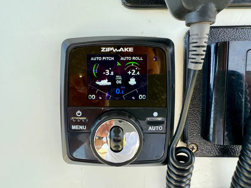 Slide: The Image of Zipwake control panel on 2016 Key Largo 2100 WI CC boat, displaying auto pitch and roll settings. - 11