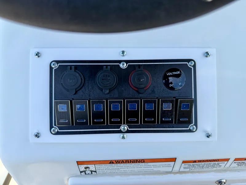 Slide: The Image of Control panel of 2016 Key Largo 2100 WI CC boat with switches and voltage meter. - 15