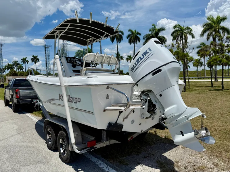 Slide: The Image of 2016 Key Largo 2100 WI CC boat with Suzuki outboard motor on trailer. - 6