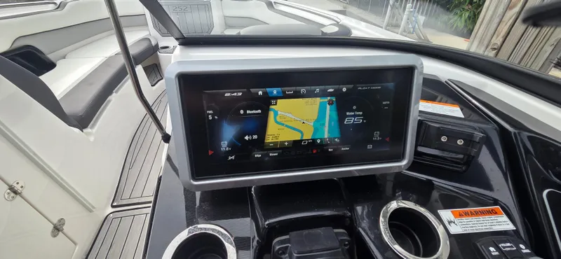 Slide: The Image of 2023 Yamaha Boats 252SD dashboard with touchscreen navigation and control panel. - 14