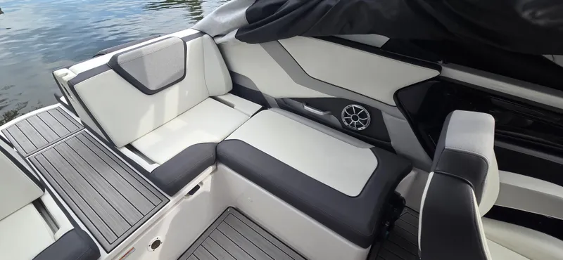 Slide: The Image of 2023 Yamaha Boats 252SD interior with sleek seating and modern design. - 15