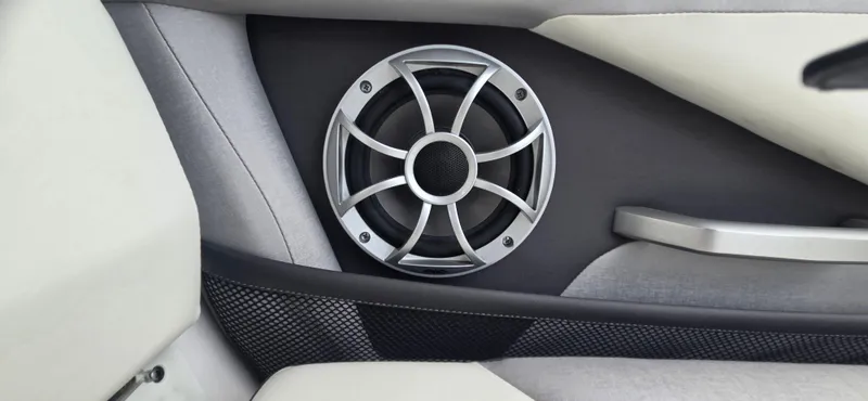 Slide: The Image of 2023 Yamaha Boats 252SD interior speaker detail with modern design. - 27