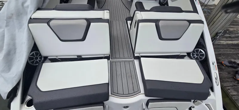 Slide: The Image of 2023 Yamaha Boats 252SD interior with sleek seating and modern design. - 33