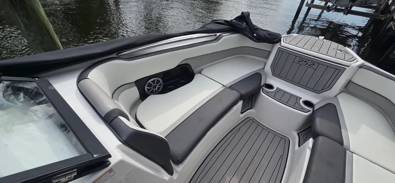Slide: The Image of 2023 Yamaha Boats 252SD interior with sleek seating and modern design. - 5