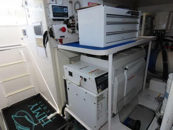 Slide: The Image of Engine room of 2009 Viking 64 Convertible with tool storage and equipment. - 11