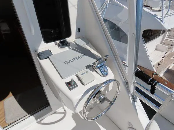 Slide: The Image of Control panel of a 2009 Viking 64 Convertible yacht with Garmin navigation system. - 16