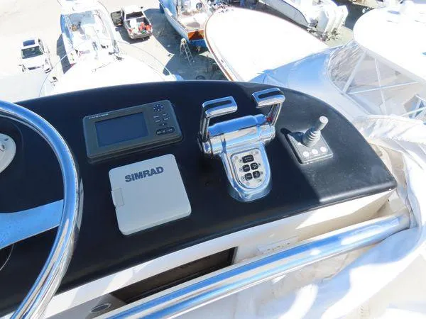 Slide: The Image of Control panel of a 2009 Viking 64 Convertible yacht with navigation equipment. - 24
