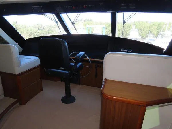 Slide: The Image of Interior helm of 2009 Viking 64 Convertible yacht with Garmin navigation system. - 27