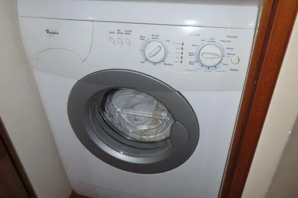 Slide: The Image of Washing machine in a 2009 Viking 64 Convertible yacht interior. - 38