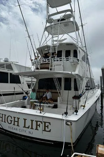 Slide: The Image of 2009 Viking 64 Convertible yacht docked, named "High Life," in Ocean City, NJ. - 5