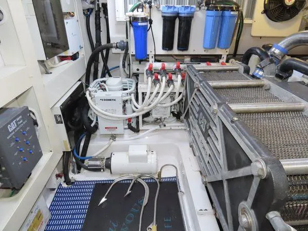 Slide: The Image of Engine room of 2009 Viking 64 Convertible yacht with CAT machinery and filtration system. - 9