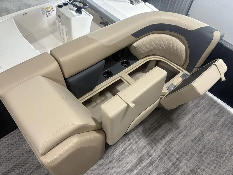 Slide: The Image of Luxurious seating on 2025 Godfrey Sweetwater 2286 SFLC pontoon boat with storage compartments. - 10