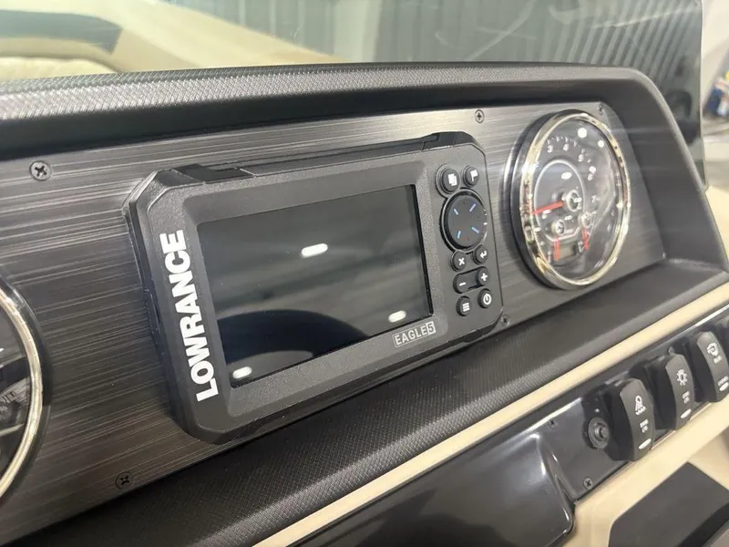 Slide: The Image of Dashboard of 2025 Godfrey Sweetwater 2286 SFLC with Lowrance Eagle5 display and gauges. - 24