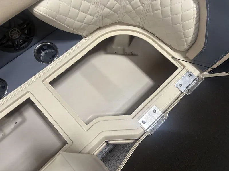 Slide: The Image of Interior storage compartment of 2025 Godfrey Sweetwater 2286 SFLC boat with quilted seating. - 4