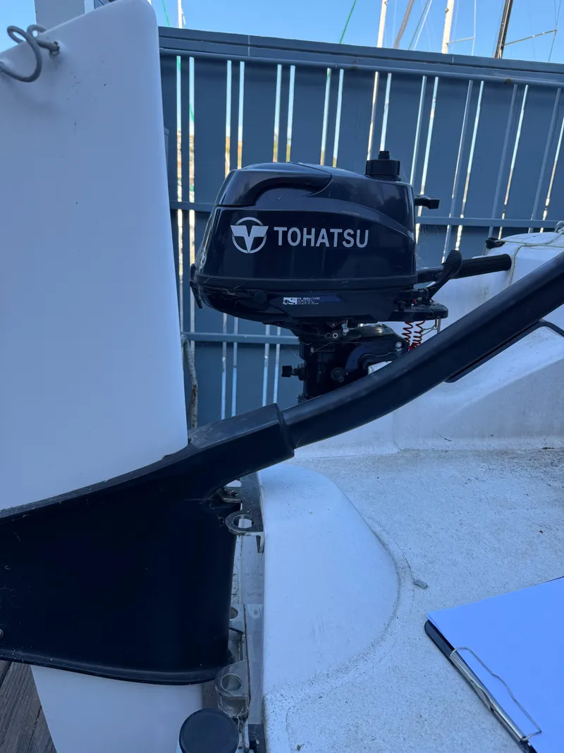 Slide: The Image of Tohatsu outboard motor on 2018 Corsair 760 Sport boat deck. - 7