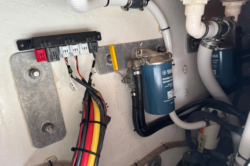 Slide: The Image of 2023 Calypso Center Console boat wiring and fuel filter system. - 24