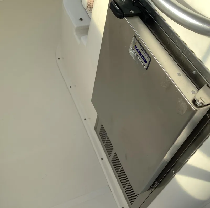 Slide: The Image of 2006 Cabo 35 Flybridge Sportfisher with Raritan marine refrigerator in cockpit area. - 12