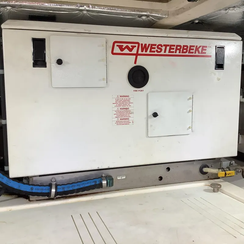 Slide: The Image of Westerbeke generator in 2006 Cabo 35 Flybridge Sportfisher engine room. - 39