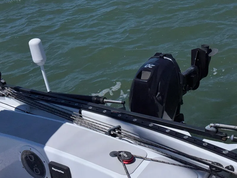 Slide: The Image of Marstrom Seacart 30 sailboat with outboard motor on water, 2015 model. - 13