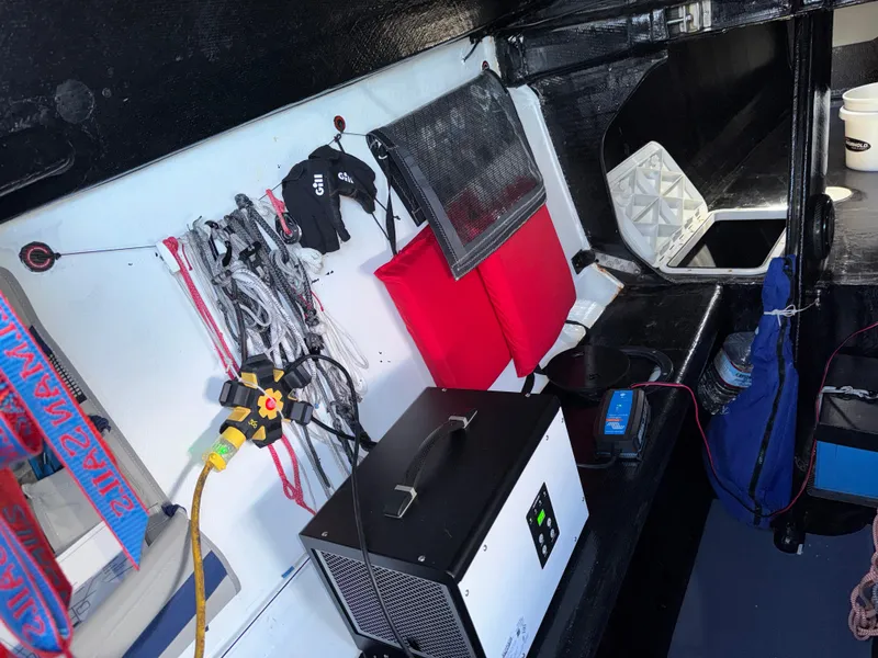 Slide: The Image of Interior of a 2015 Marstrom Seacart 30 sailboat with equipment and storage. - 9