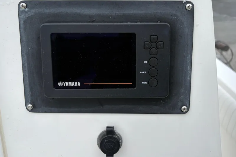 Slide: The Image of Yamaha display panel on 2005 Regulator 24 Classic boat dashboard. - 21
