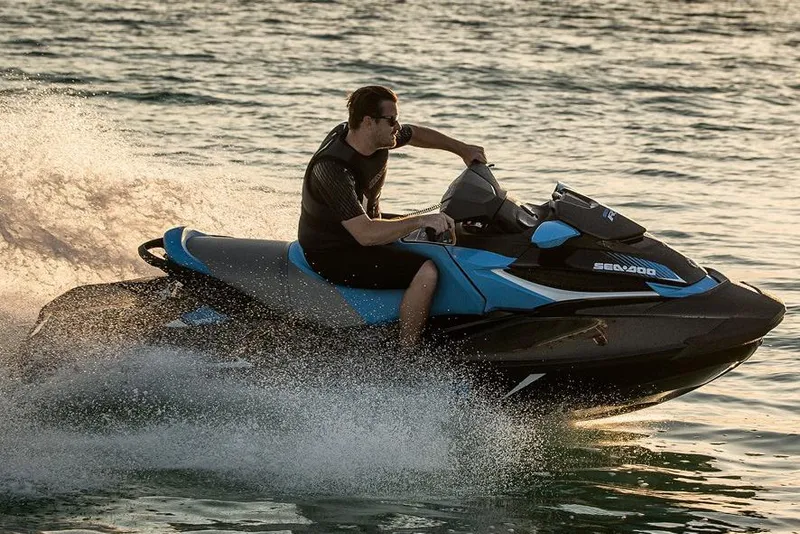 Slide: The Image of Manufacturer Provided Image: Man riding 2017 Sea-Doo RXT 260 jet ski on water. - 12