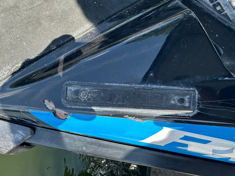 Slide: The Image of 2017 Sea-Doo RXT 260 with visible hull identification number on black surface. - 15