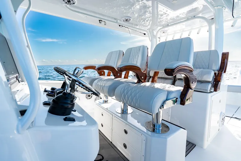 Slide: The Image of Luxurious interior of 2023 Freeman 43 boat with plush seating and ocean view. - 24