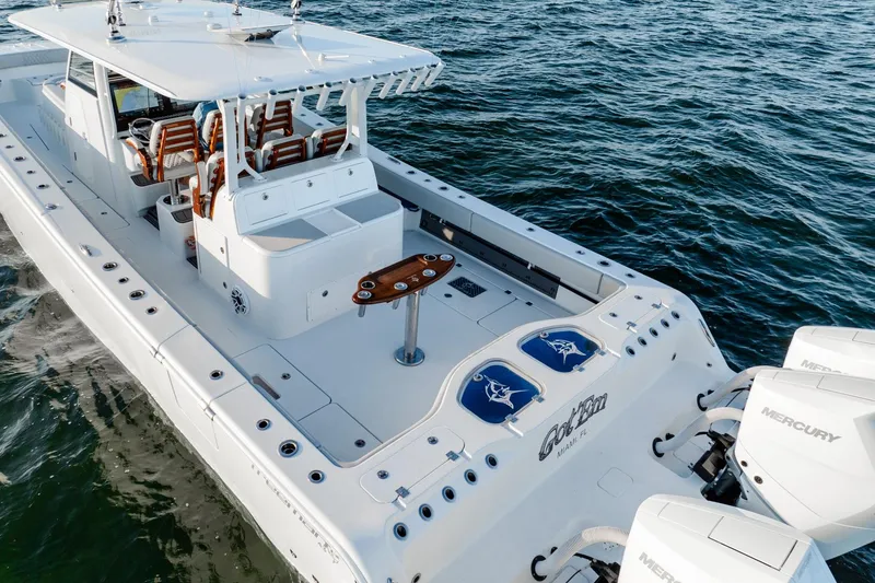 Slide: The Image of 2023 Freeman 43 boat with Mercury engines on open water. - 8