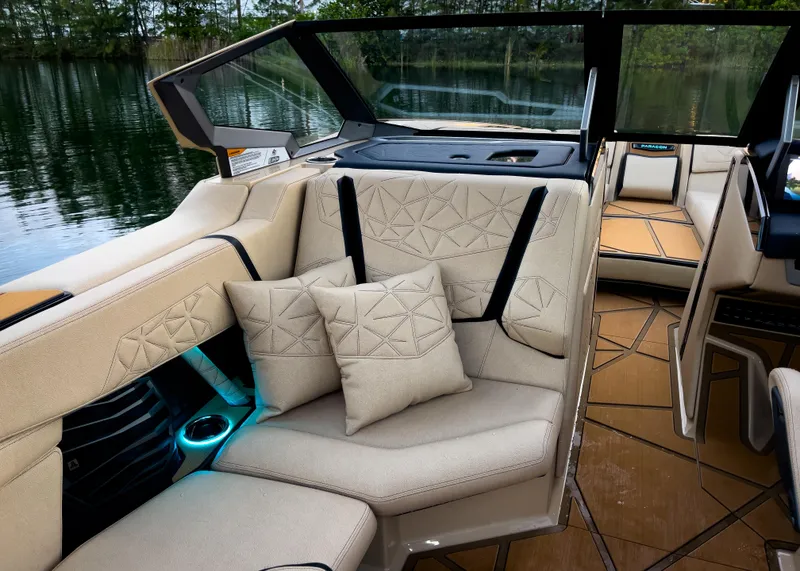 Slide: The Image of Luxurious interior of 2026 Nautique Paragon G25 boat with plush seating and elegant design. - 7