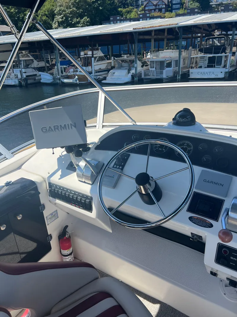 Slide: The Image of Helm of 2005 Meridian 490 Pilothouse yacht with Garmin navigation. - 3