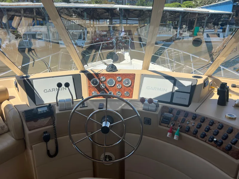 Slide: The Image of Helm of a 2005 Meridian 490 Pilothouse yacht with Garmin navigation. - 4