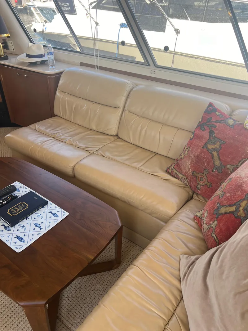 Slide: The Image of Interior of a 2005 Meridian 490 Pilothouse yacht with leather sofa. - 6